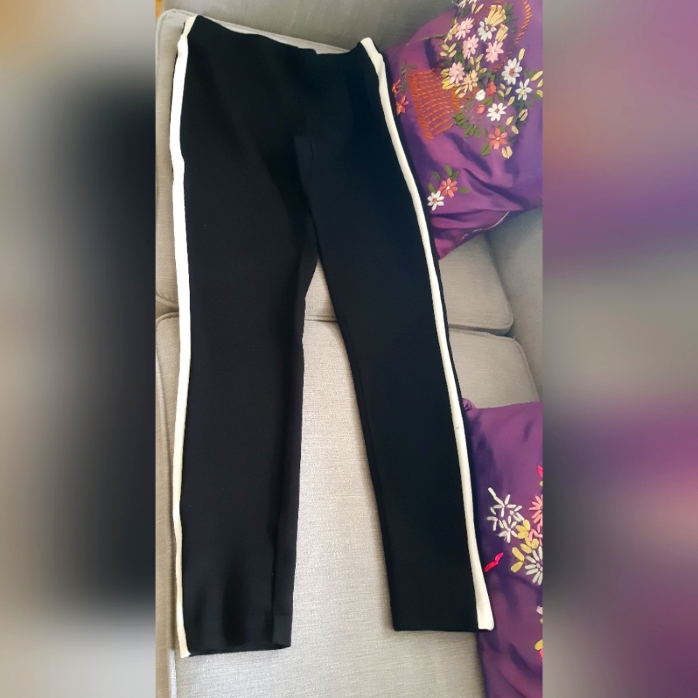 Pants with white stripes